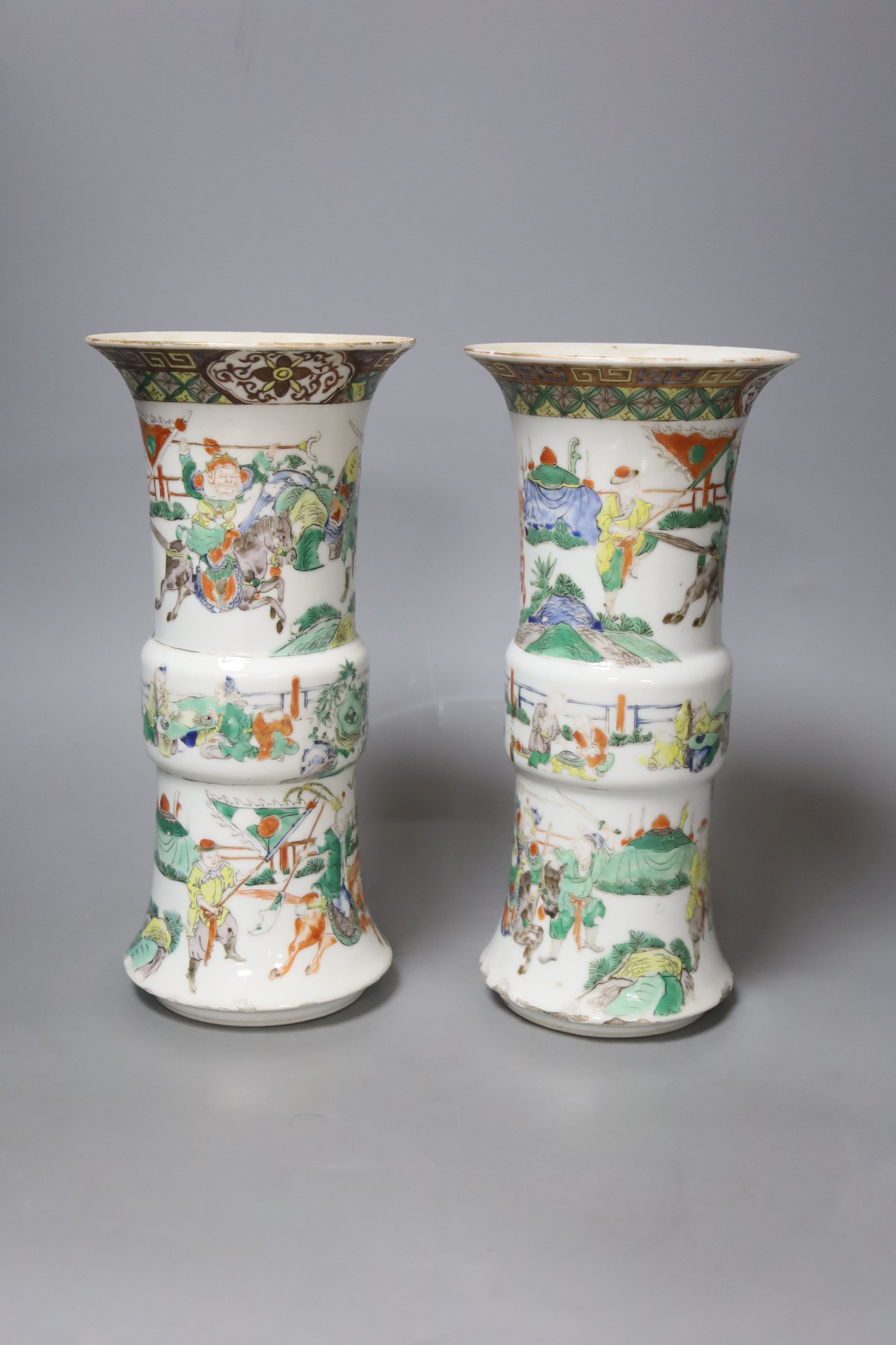 A pair of late 19th/early 20th century century Chinese famille verte beaker vases, height 25.5cm